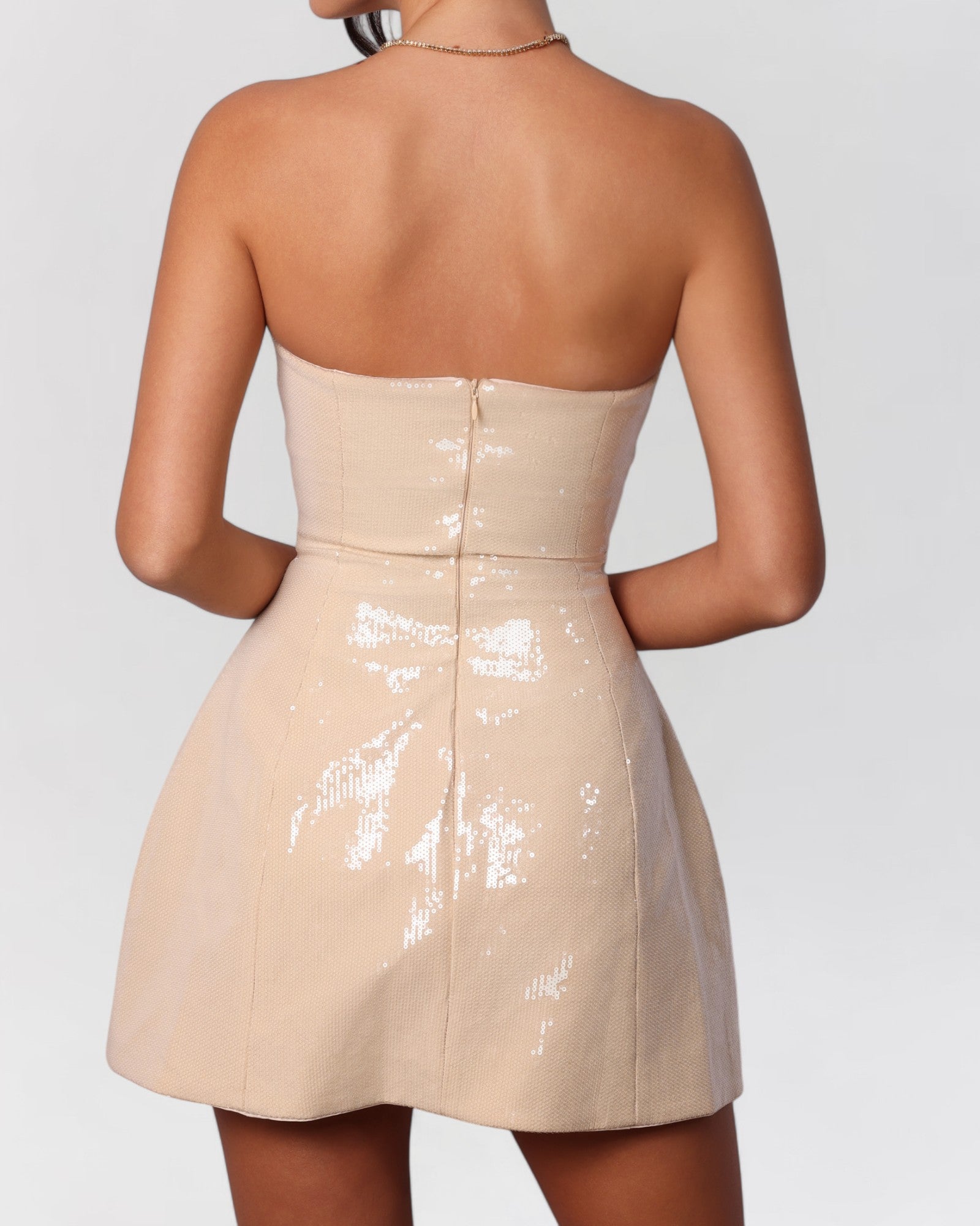 Nude sequin strapless a-line pocket mini dress